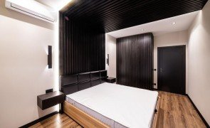 decoração de quarto feito com acabamento ripado