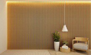 painel ripado decorando a parede interna de casa